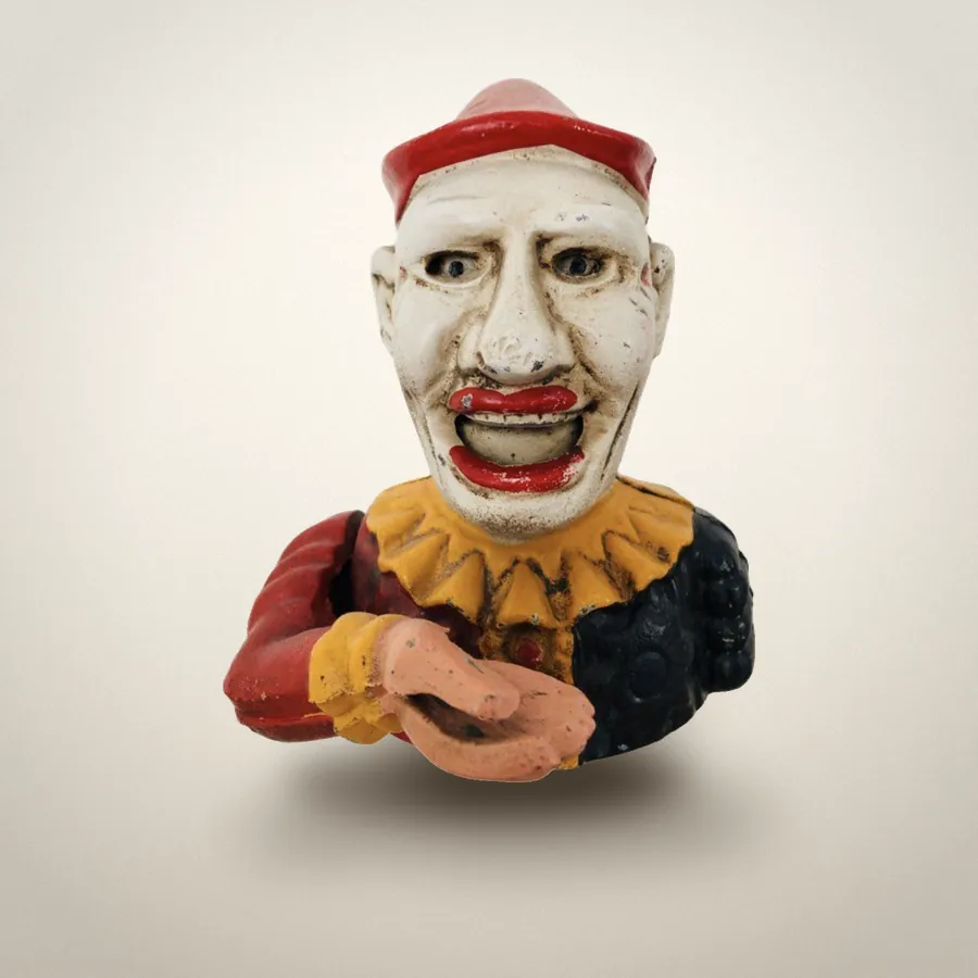 Tirelire clown en fonte, vers 1950